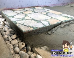 งานวางระดับปูกระเบื้องลาดจอดรถ
